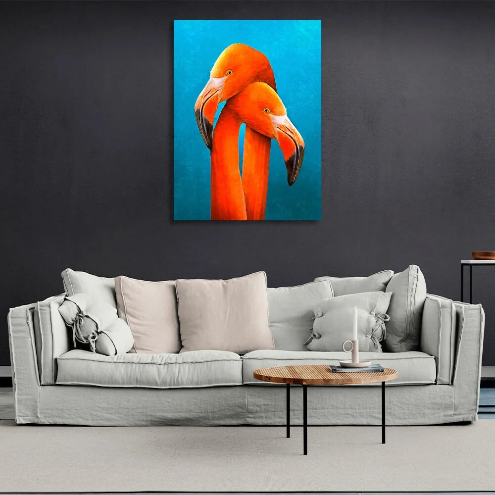 Two orange flamingos on a blue background Canvas Wall Art Print